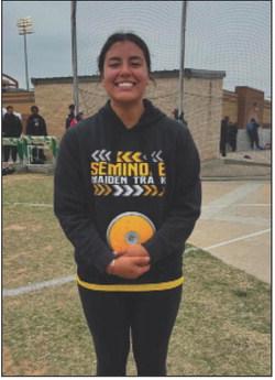 Seminole’s Ava Olivas poses for a photo after competing in the discus competition at the Region I-4A Track and Field Championships on Friday at Lowrey Field in Lubbock. Olivas finished second to qualify for the 2024 UIL Class 4A State Track and Field Championships on May 2 at Mike A. Myers Stadium in Austin.