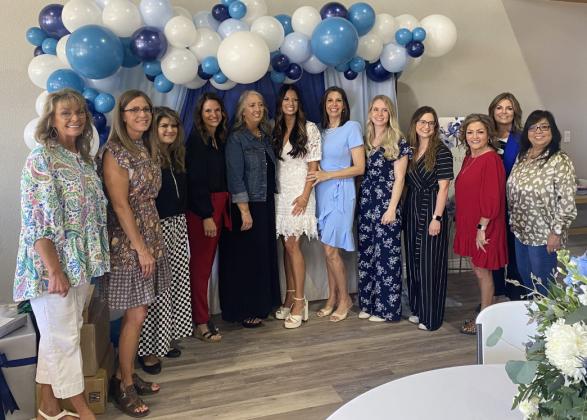 Miss Shelby Bradshaw, bride-elect of Grant Petty was honored with a bridal shower April 29 at the Robert’s Pool House. Pictured left to right: Karen Jackson, April Grey, Carmen Roberts, Mary Elder, Janice Clark, Shelby Bradshaw, Shelly Petty, Brittany Quiring, Brooke McCormick, Melissa Hope, Paige Freeman and Elisa Guerra.